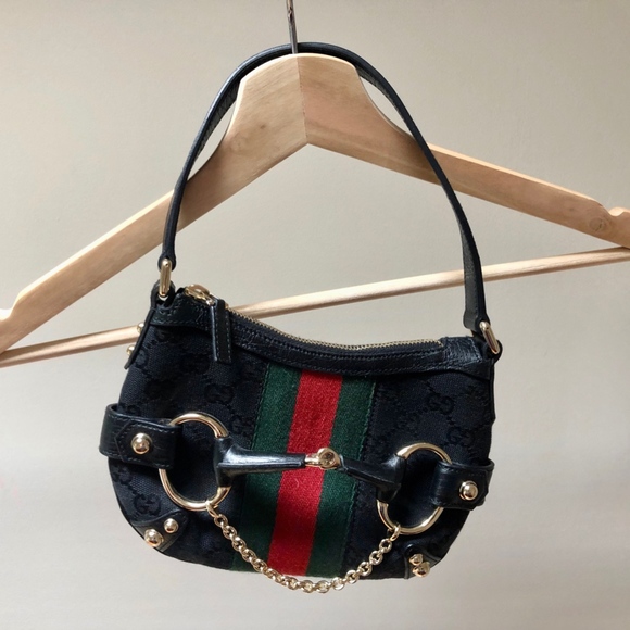 Gucci Handbags - Classic Gucci Handbag with gold hardware